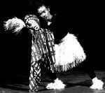 Senegalese dancer holding a puppet